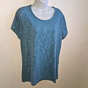 Blue shirt with swirl patter